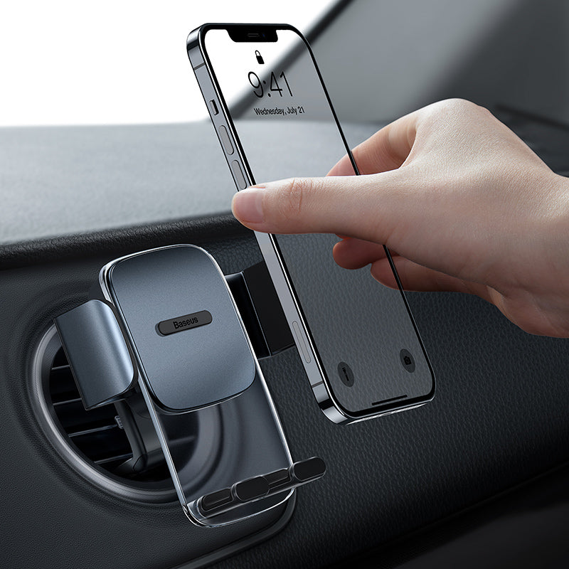 Car phone mount air vent holder in use, securely holding a smartphone while being attached to a car air vent.