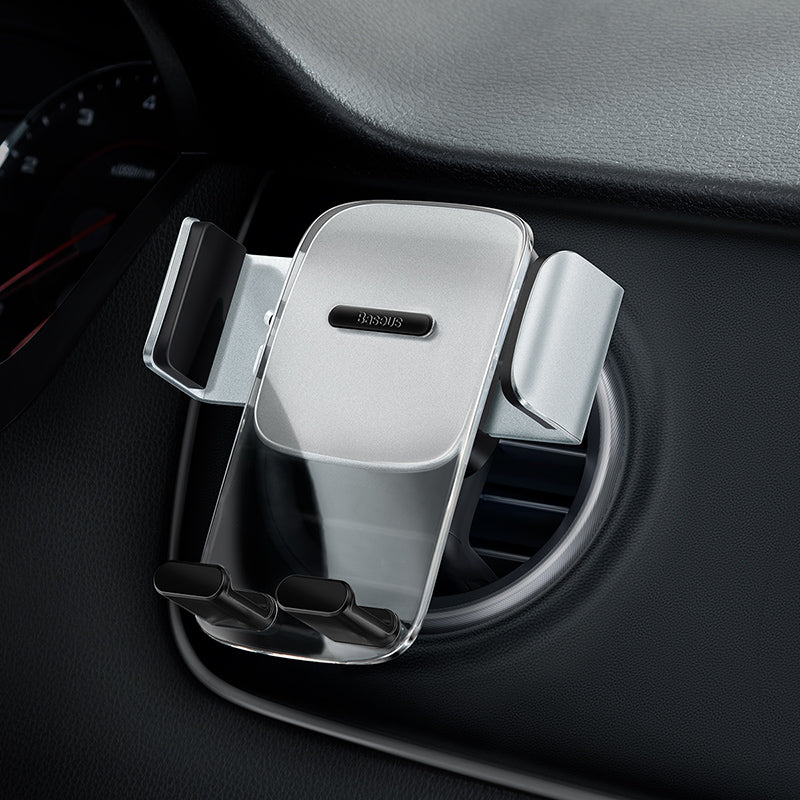 Tri Charge Co car phone mount air vent holder installed on car dashboard for secure phone access while driving.